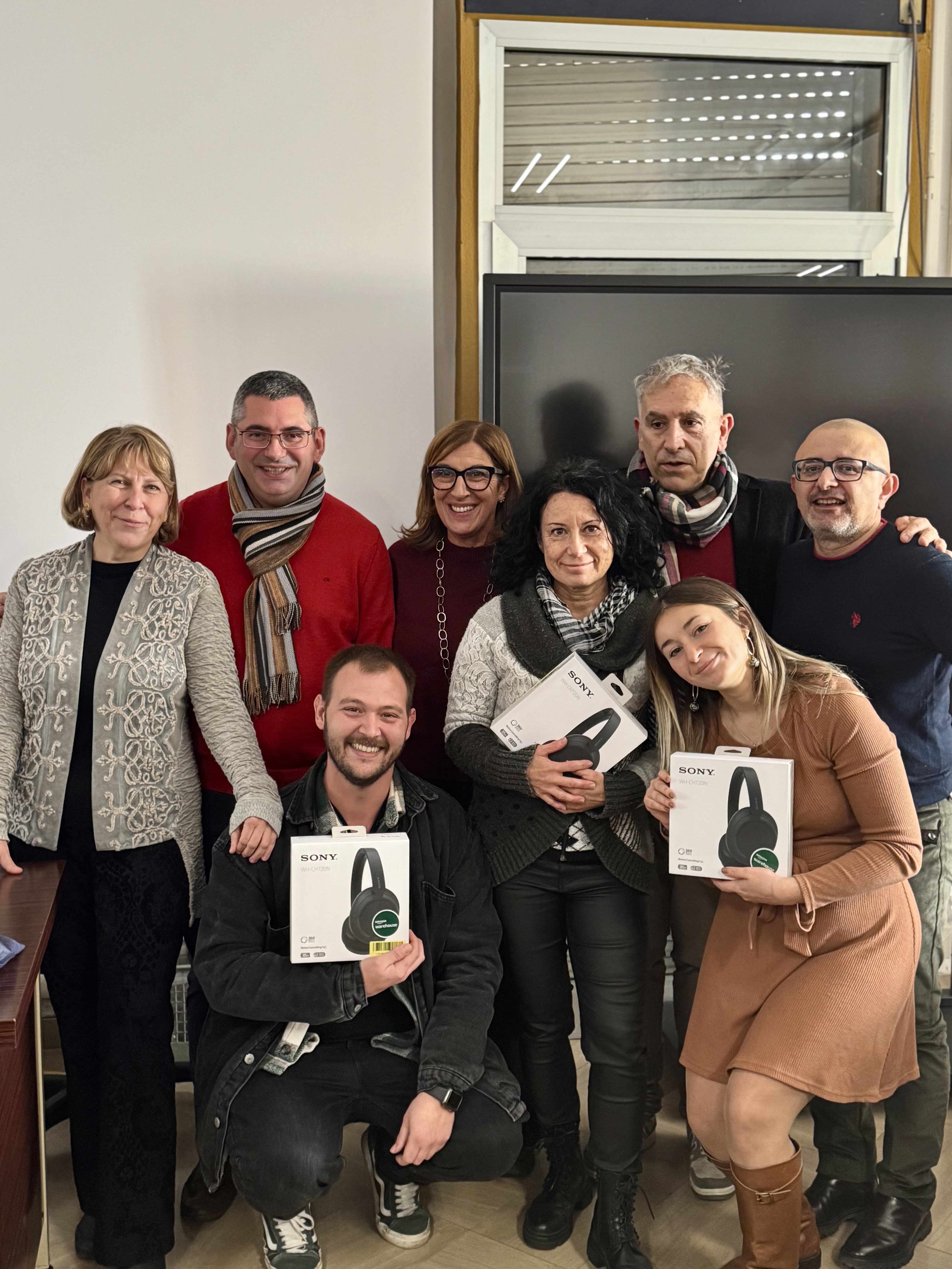 Foto di gruppo dei docenti e dei dottorandi/e vincitori della sessione poster